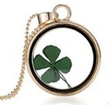 Dried Four Leaf Clover encased in a Glass Pendant